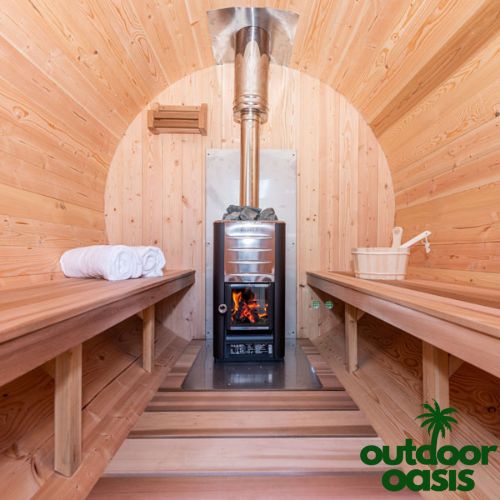 Dundalk-8-Person-Tranquility-Barrel-Sauna-Interior-View-of-Steam-Heater-and-Benches