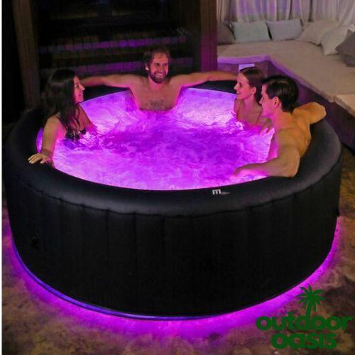 Aurora-6-Person-Hot-Tub-U-AU061-Couples-in-Backyard-with-LEDs-on