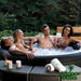 Camaro-6-Person-Hot-Tub-with-Couples-Relaxing-Inside